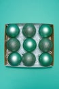 Top view of collection of green christmas balls