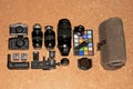 Top view of collection of professional camera lenses and equipment