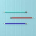 Top view of collection of three pencils color horizontal on point pattern blue background. minimal creative concept. case study c Royalty Free Stock Photo