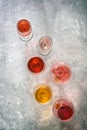 Top view collection of various wines, white, pink, red on a gray concrete background. Wine tasting concept