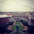 Top view from the colonnade of St. Isaac`s Cathedral on St. Isaac`s Square and the city. Saint-Petersburg, Russia. Square photo Royalty Free Stock Photo