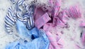 Color clothes soak in powder detergent water dissolution. Laundry concept