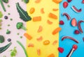 color fruit and vegetables on pink,yellow and blue background