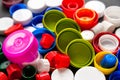 Top view of colored PET caps. Recycled plastic bottle caps. Separate garbage collection. Recycling of plastic for prosthetics. Royalty Free Stock Photo