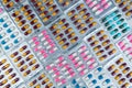Top view of colorful antibiotic capsule pills in blister pack. Antibiotic drug resistance. Pharmaceutical industry. Pharmacy drug Royalty Free Stock Photo