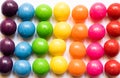 Top view of colorful candies on white background