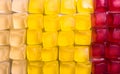 Top view on colorful cube shaped jelly candy. Candy background