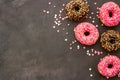 Top view of colorful glazed donut swith sprinkles, copy space Royalty Free Stock Photo