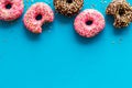 Top view of colorful glazed donut swith sprinkles, copy space Royalty Free Stock Photo