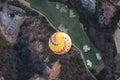 Top view of colorful hot air balloons on the sky over golf court. Royalty Free Stock Photo