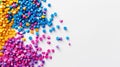 Top view of colorful polymer masterbatch granules, light background, industrial plastic template. Generative AI Royalty Free Stock Photo
