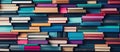 Top view on colorful stacked books. Education and learning concept background