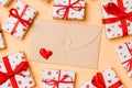 Top view of colorful valentine background made of craft envelope, gift boxes and red textile hearts. Valentine\'s Day concept Royalty Free Stock Photo