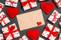 Top view of colorful valentine background made of craft envelope, gift boxes and red textile hearts. Valentine\'s Day concept Royalty Free Stock Photo