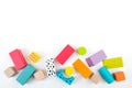 Top view of colorful wooden bricks on the table. Early learning. Educational toys on a white background Royalty Free Stock Photo