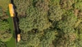 Top View of Commercial Trucks and a Forest