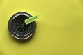 Top view of a compass and sticky note written with Purpose on yellow background with copy space