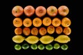 top view of composition of various ripe citrus fruits in rows