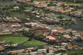 Top view of congested houseboats, shikara, boats, and houses in blue waters of Dal Lake. Jammu and Kashmir, India