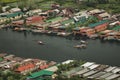 Top view of congested houseboats, shikara, boats, and houses in blue waters of Dal Lake. Jammu and Kashmir, India Royalty Free Stock Photo