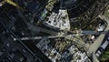 Top view of construction crane and colorful buildings of city. Stock footage. Construction site with cranes and Royalty Free Stock Photo