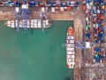 Top view of Container port and container ship transportation Royalty Free Stock Photo