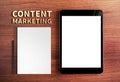 Top view of Content Marketing word and tablet and pencil,white p