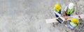 Top view of contractors, engineers and formats team in safety vests with helmets working with laptops, standing on under- Royalty Free Stock Photo