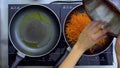 The top view of the cook caramelizes beets and carrots