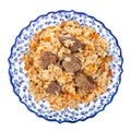 top view of cooked plov on local ceramic plate Royalty Free Stock Photo