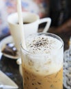 Top view of cool capuccino coffee on desk Royalty Free Stock Photo