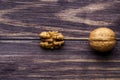 top view copy space inshell walnuts and peeled on a wooden table Royalty Free Stock Photo