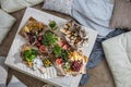 Top view cosiness lounge interior with serving table ready for party celebrating hygge boho scandi