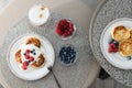 Top view of cottage cheese pancakes with blueberries and raspberries Royalty Free Stock Photo