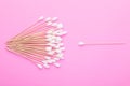 Top view cotton bud for cleaning the ears on pink Royalty Free Stock Photo