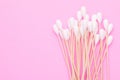 Top view cotton bud for cleaning the ears on pink