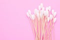 Top view cotton bud for cleaning the ears on pink Royalty Free Stock Photo