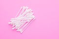 Top view cotton bud for cleaning the ears on pink Royalty Free Stock Photo