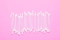 Top view cotton bud for cleaning the ears on pink