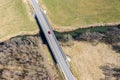 Top view of country road and bridge over small river Royalty Free Stock Photo