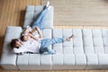 Top view of couple relaxing on sofa Royalty Free Stock Photo