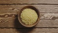 TOP VIEW: Couscous in a wooden dish