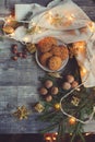Top view of cozy Christmas and winter setting with homemade cookies, coffee, nuts, weekly planner and New Year decorations Royalty Free Stock Photo