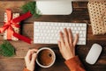 Top view of a cozy office workplace with a computer and keyboard.