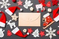 Top view of craft envelope. New Year decorations on black background. Merry Christmas concept Royalty Free Stock Photo