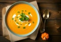 Top View of Creamy Pumpkin and Carrot Soup with Fresh Parsley on Dark Wooden Background - Copy Space Included Royalty Free Stock Photo