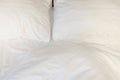 Top view of the crease of an unmade bed sheet in the bedroom after a long night sleep and waking up in the morning Royalty Free Stock Photo