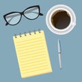 Top view creative business desktop. Workspace of office employee at begining of a work day. Royalty Free Stock Photo