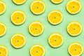 Top view of creative pattern made of lemons slices
