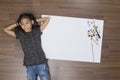 Top view creative photo of girl on wooden floor